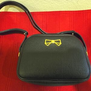 Nina Ricci Black Shoulder Bag with Gold Bow Accent
